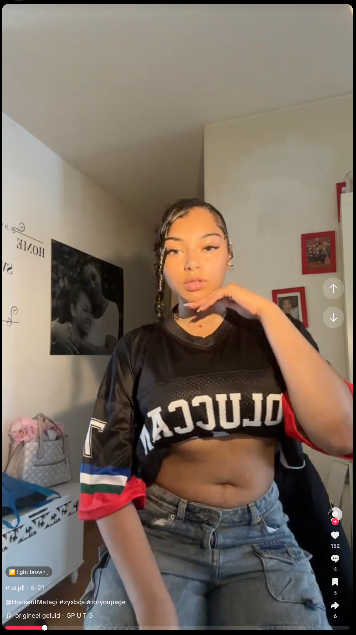 Creator styling the MATAGI Moluccan Jersey in a cropped look