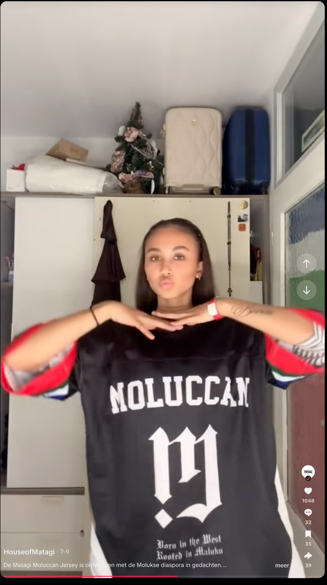 Creator holding the MATAGI Moluccan Jersey to camera