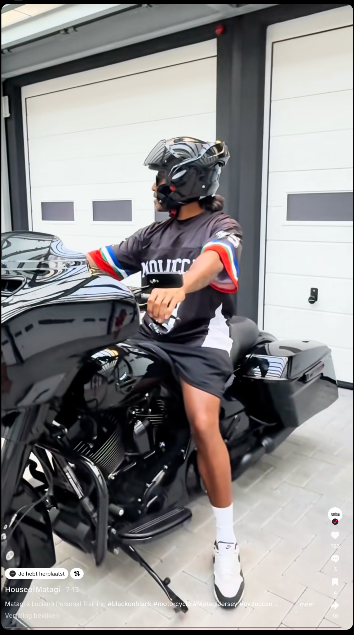 Creator wearing the MATAGI Moluccan Jersey on a motorcycle
